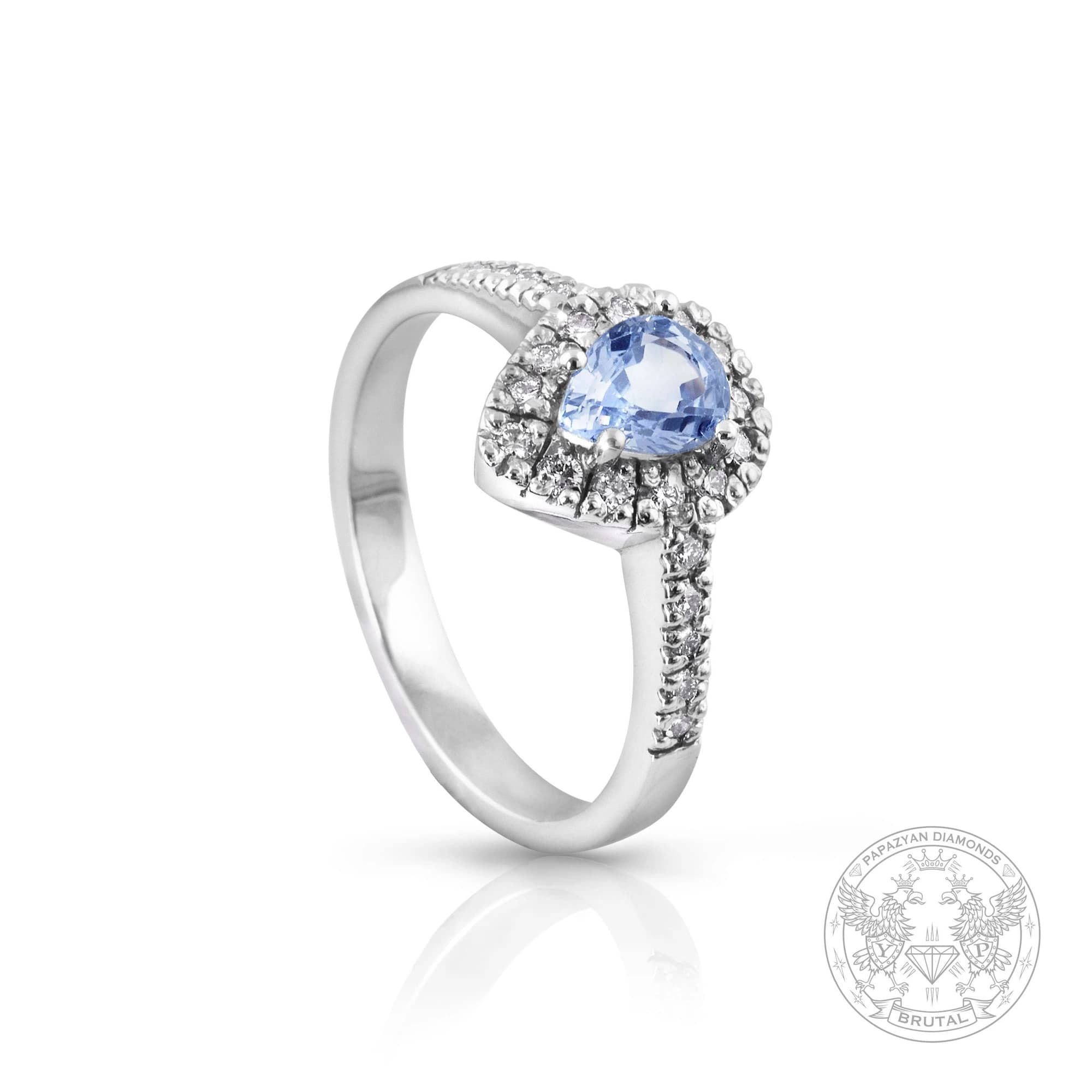 Годежен пръстен със сапфир 0,61 ct и странични брилянти 0,18 ct в бяло злато 750