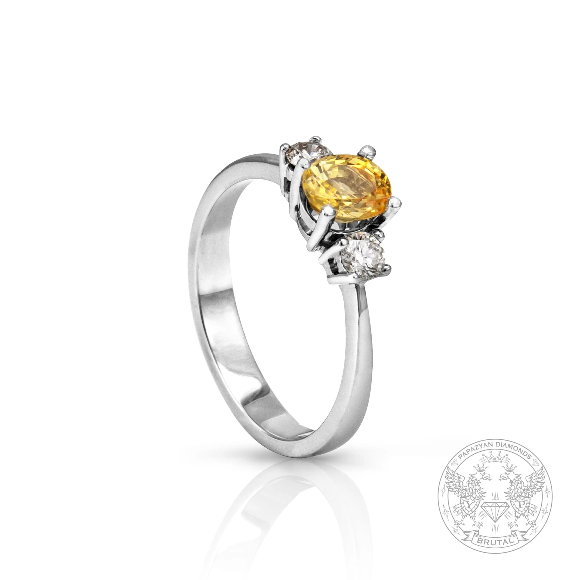 Годежен пръстен със сапфир Oval 0,8 ct и странични брилянти 0,2 ct в бяло злато 585