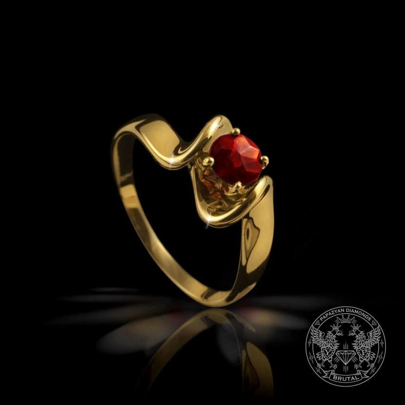 Годежен пръстен с гранат 0,53 ct в жълто злато 585