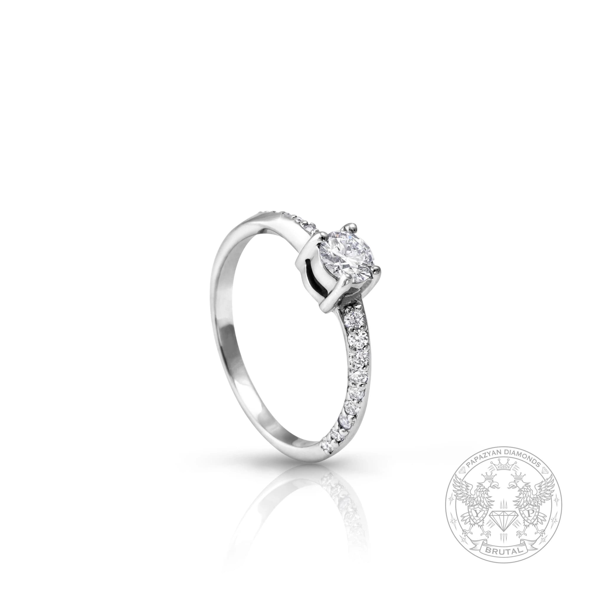 Годежен пръстен с диамант 0,39 ct и странични брилянти 0,22 ct в бяло злато 585