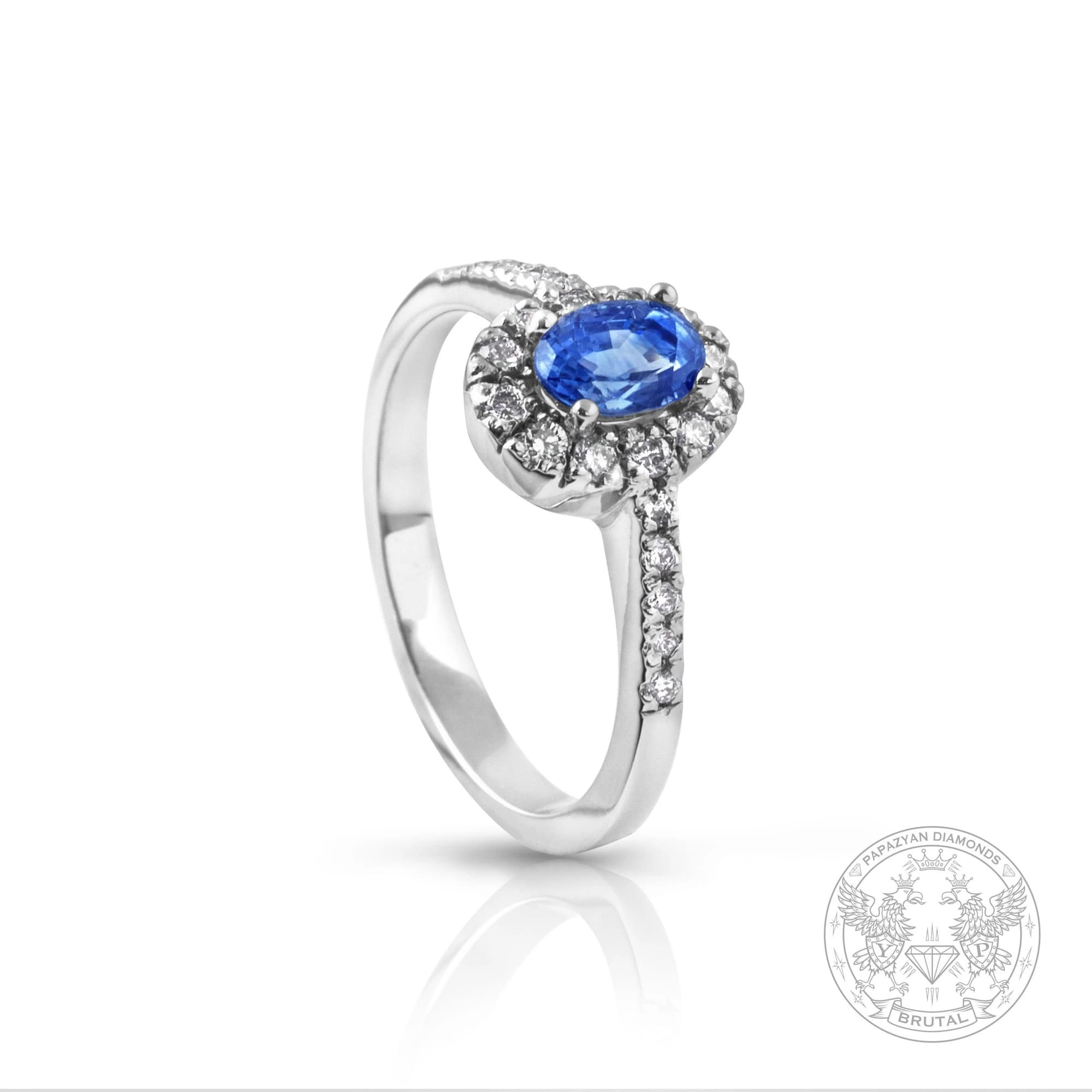 Годежен пръстен със сапфир 0,73 ct и странични брилянти 0,17 ct в бяло злато 750