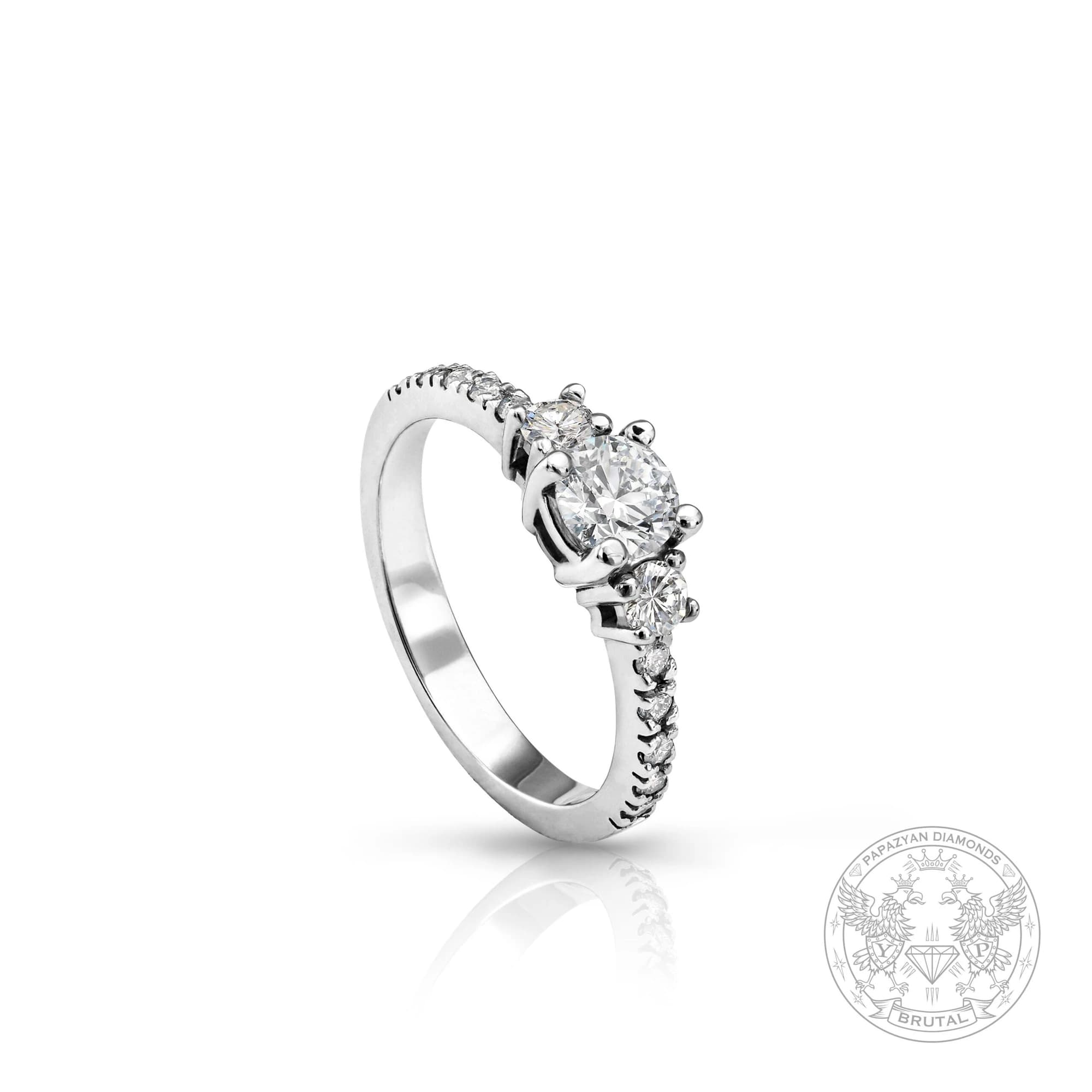 Годежен пръстен с диамант 0,4 ct и странични брилянти 0,27 ct в бяло злато 585