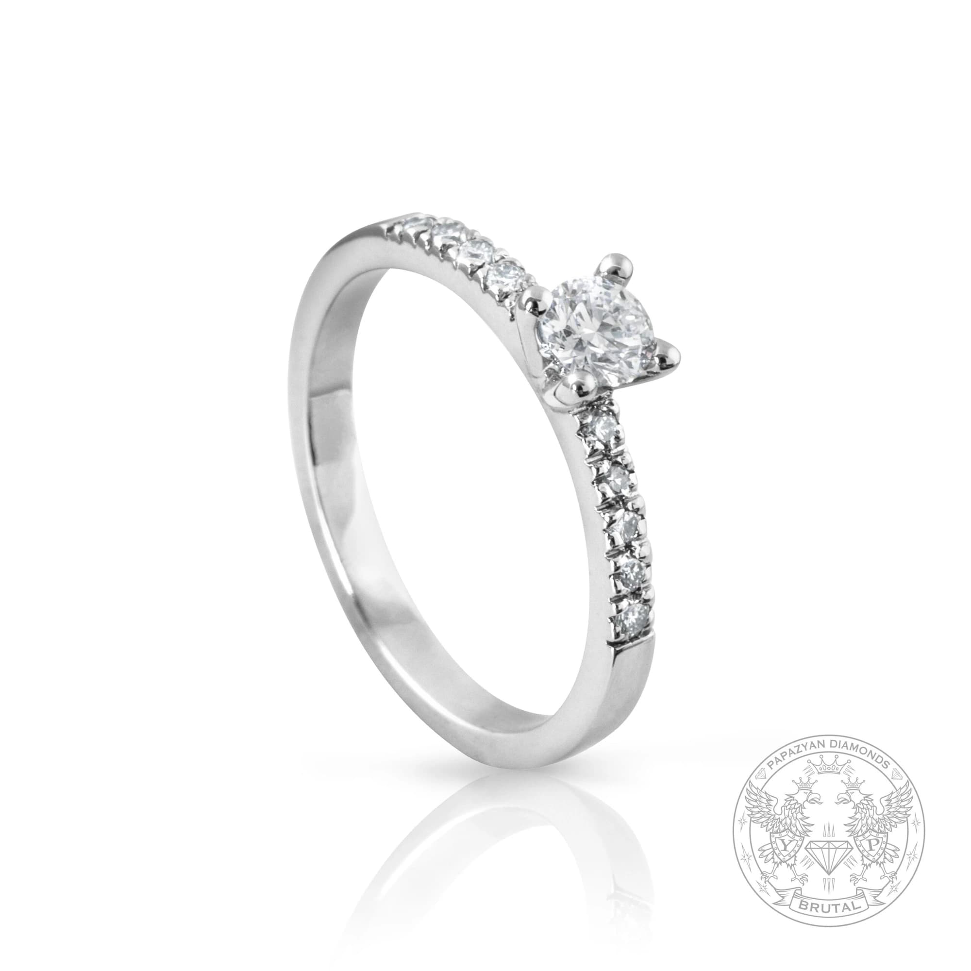 Годежен пръстен с диамант 0,2 ct и странични брилянти 0,12 ct в бяло злато 585