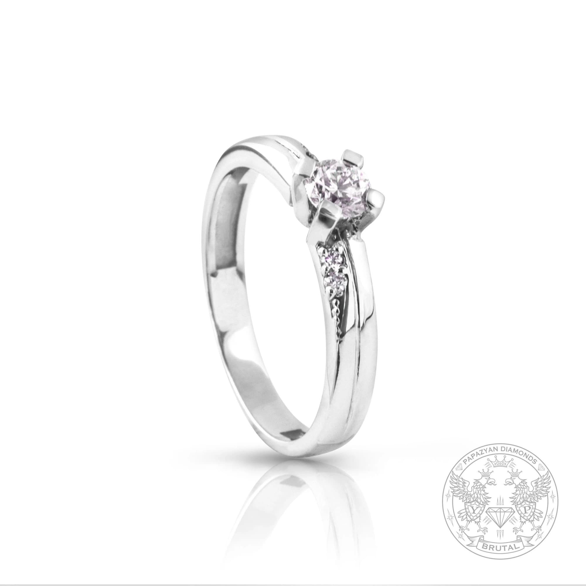 Годежен пръстен с диамант 0,023 ct и странични брилянти 0,03 ct в бяло злато 585