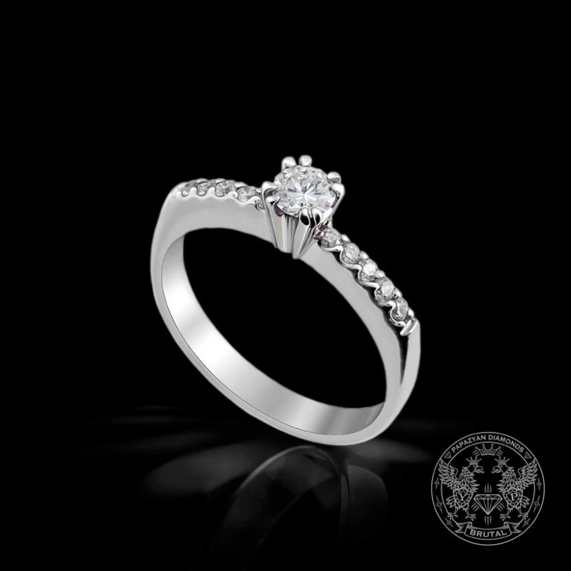 Годежен пръстен с диамант 0,19 ct и странични брилянти 0,17 ct в бяло злато 585 — снимка 1