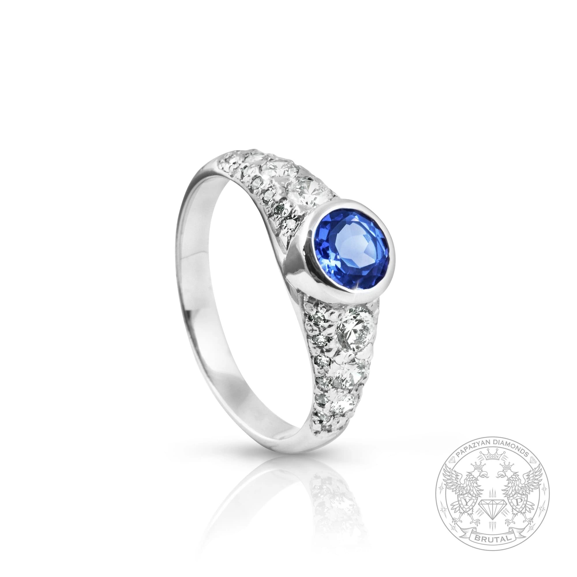 Годежен пръстен с танзанит 0,6 ct и странични брилянти 0,37 ct в бяло злато 750